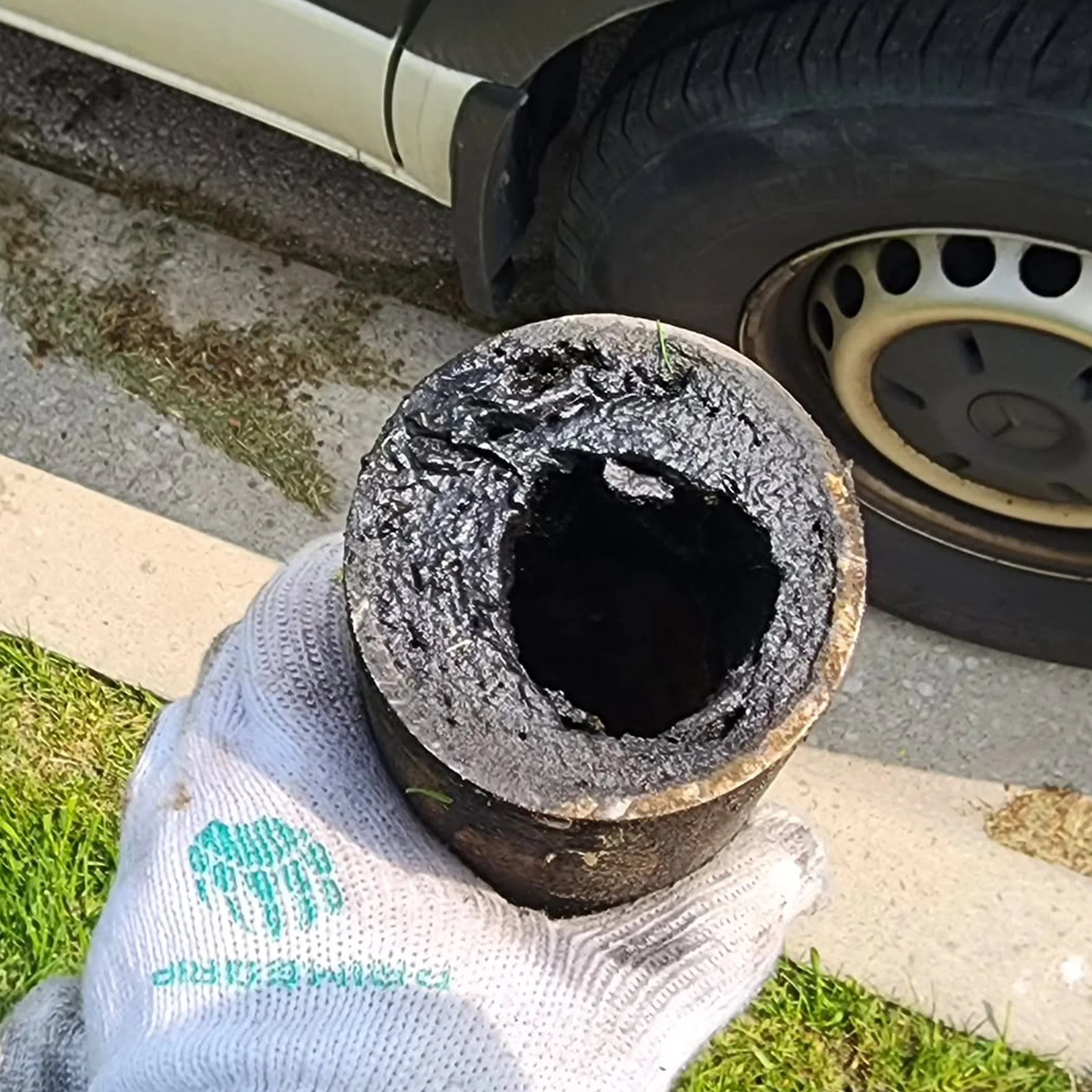 clogged cast-iron drain pipe